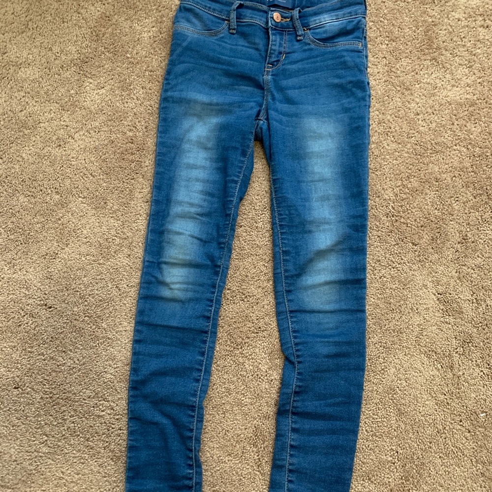 A light wash pair of jeggings